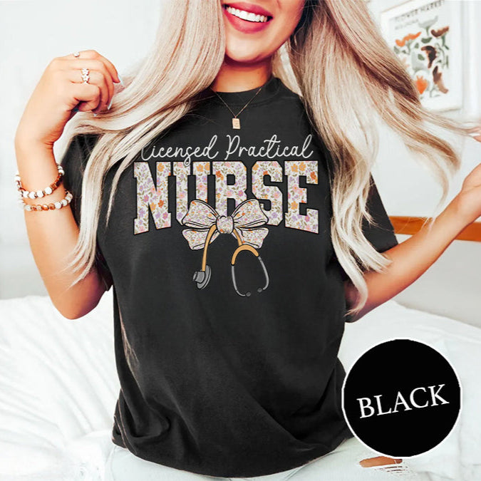 Person wearing a black 'Licensed Practical Nurse' t-shirt with decorative text and stethoscope graphic.