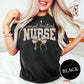 Person wearing a black 'Licensed Practical Nurse' t-shirt with decorative text and stethoscope graphic.