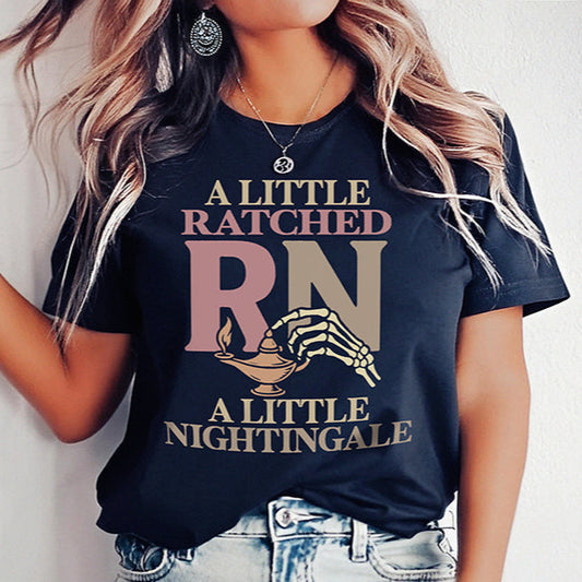 Person wearing a navy blue t-shirt with text and graphics, standing against a plain background.