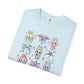Folded light blue t-shirt with labubu nurse cartoon characters and bows design on a white background