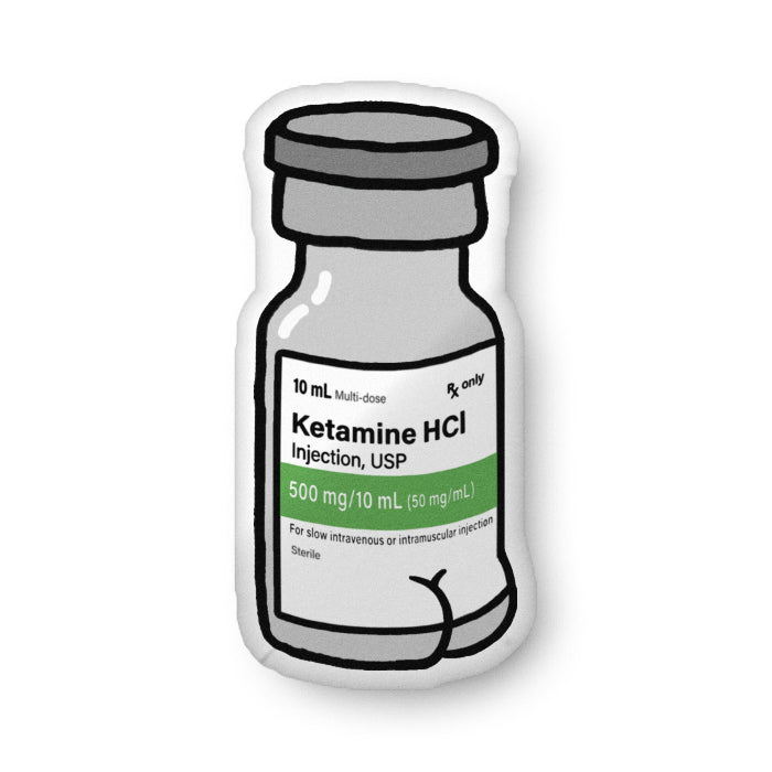 Ketamine HCI injection vial with label on a white background