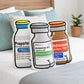 Decorative pillows shaped like medical vials on a bed